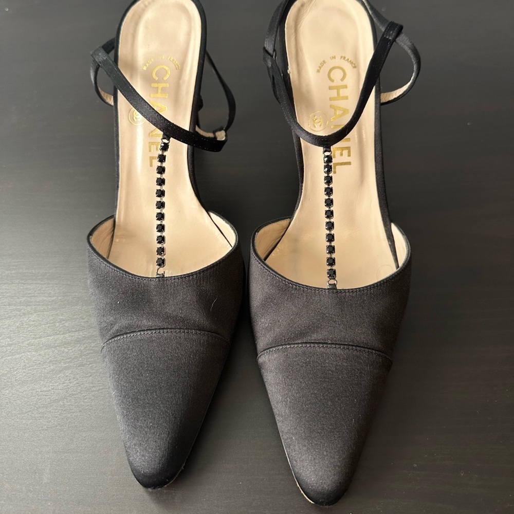 Chanel satin t-strap pumps.